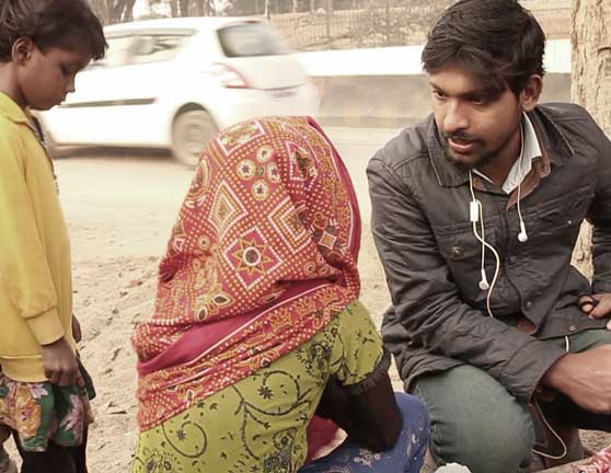 Aditya Soni, in streets with a stranted kid.