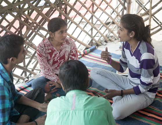 Anjali Shukla tutoring the elder students